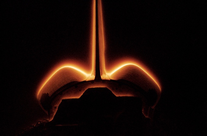 Shuttle glow: When atomic oxygen from the high atmosphere combines with nitric oxide on the surface of the space shuttle, the resulting excited nitrogen dioxide returns to the ground state emitting an apparent glow.