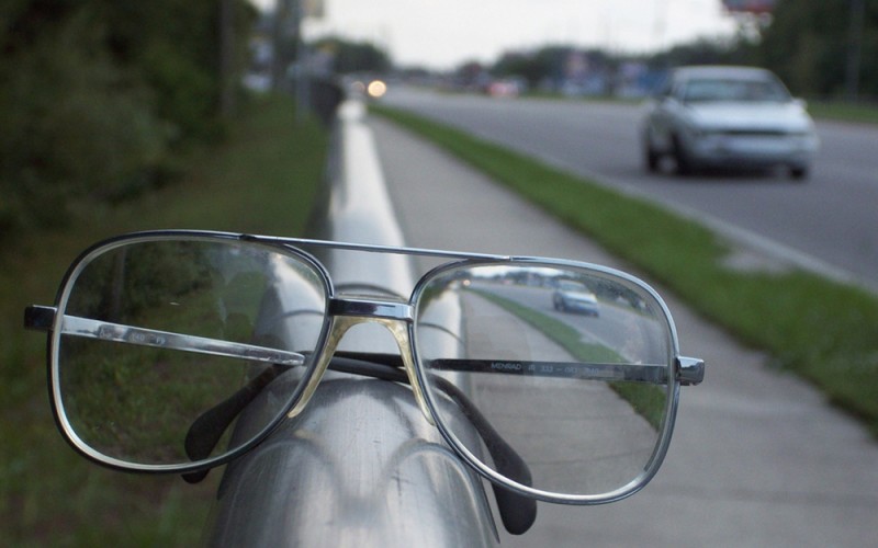 A car when viewed through a concave lens looks upright.