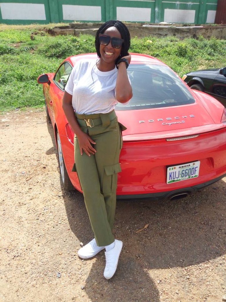 Female Corps Member Steps Out With Porsche For Clearance in Abuja