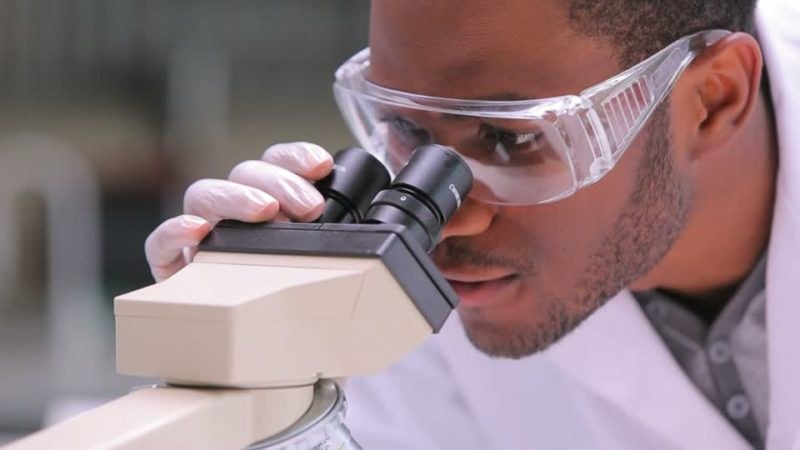 looking-through-microscope