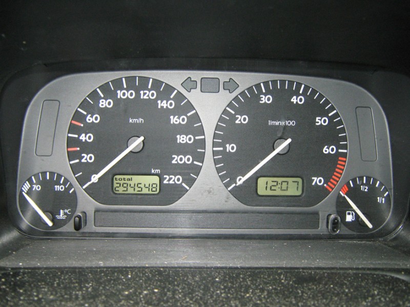This photograph shows the instruments on a gray Volkswagen Vento dashboard, including the speedometer, odometer, and fuel and temperature gauges, showing some readings.